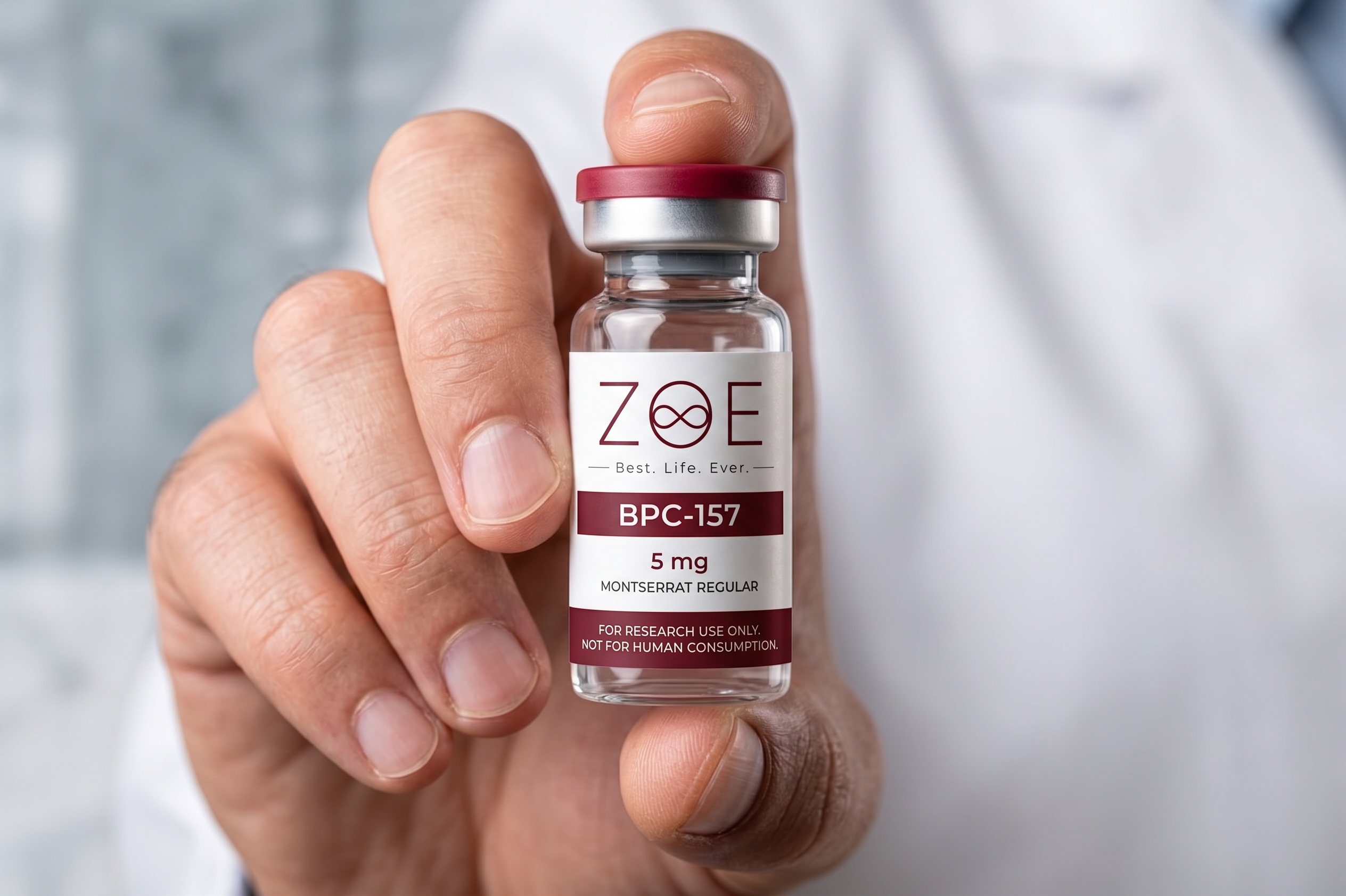 Hand holding BPC-157 vial